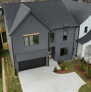 a view of backyard with seating space