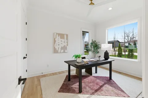 a view of a workspace with furniture