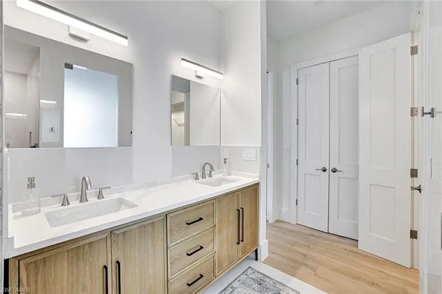 a bathroom with a sink and a mirror