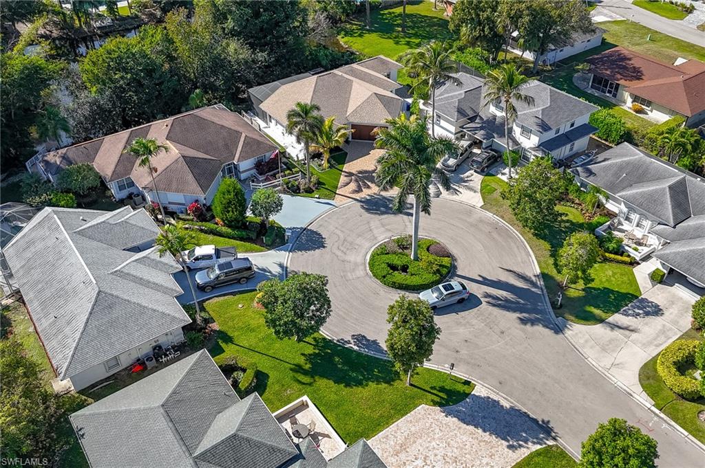 2515 Royal Palm Court Naples, FL 34103 - Photo 31 of 32 an aerial view of a house with a yard and garden