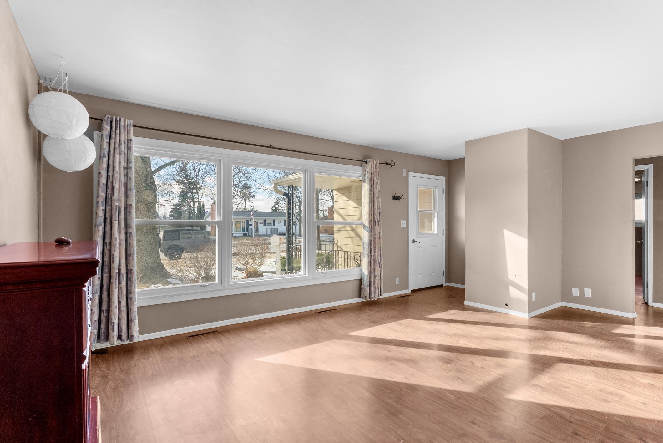 1433 North 23rd Street Manitowoc, WI 54220 - Photo 2 of 27 Newer windows throughout with transferable lifetime warranty.