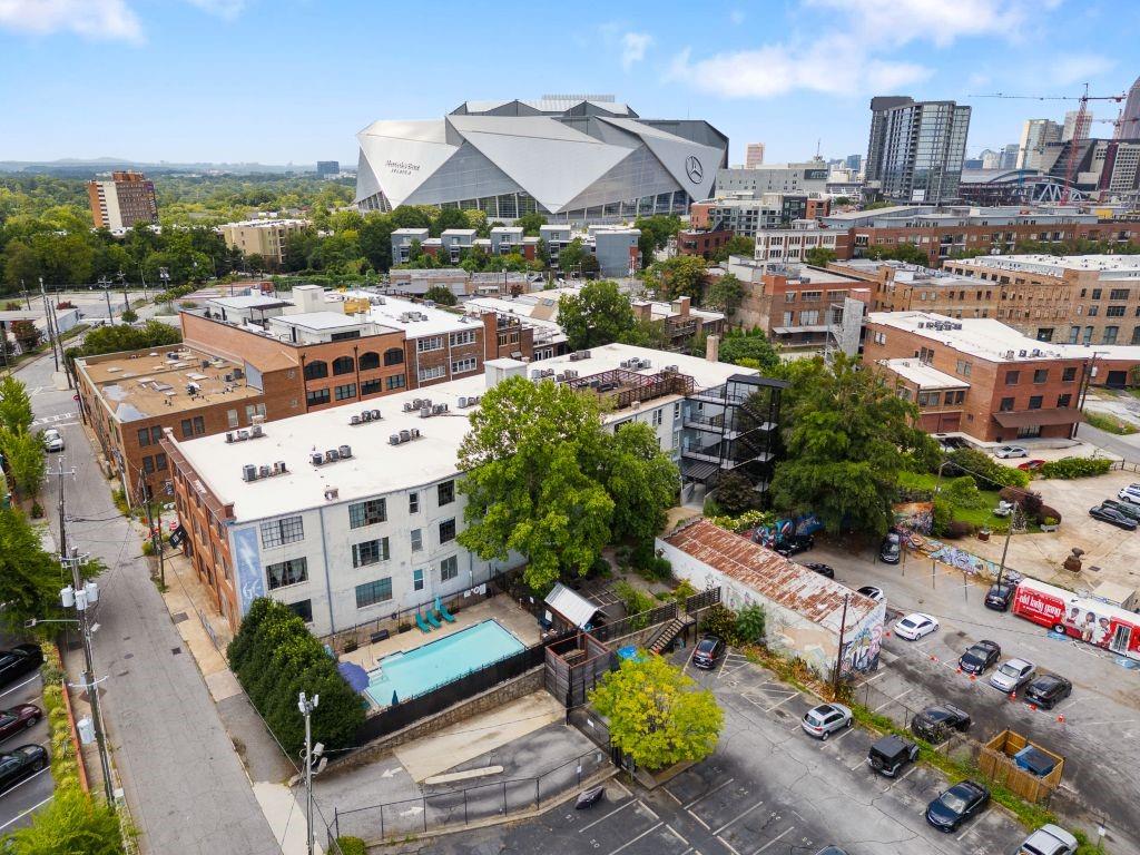 172 Haynes Street Southwest, Unit 107 Atlanta, GA 30313 - Photo 1 of 1 a city view with tall buildings