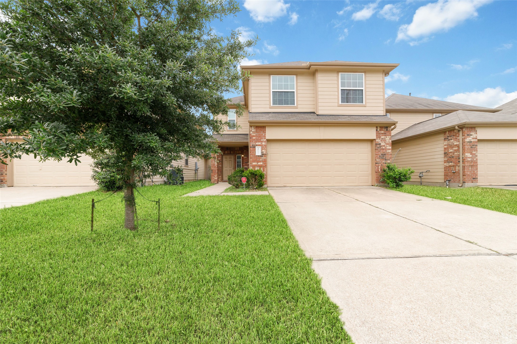 18619 Cooper Ravine Way Katy, TX 77449 - Photo 2 of 23 a front view of house with yard