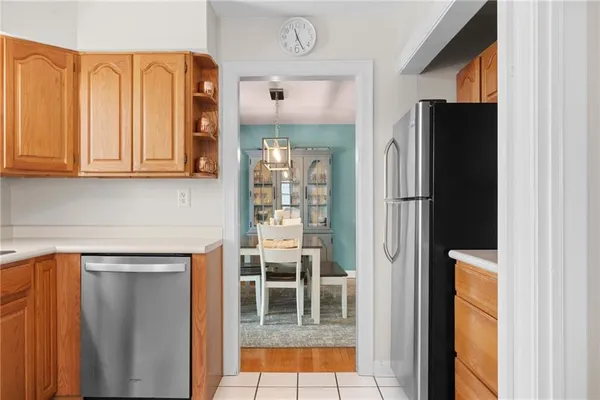 a bathroom with a toilet a sink and a window