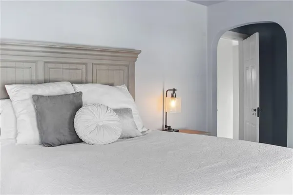 a view of a balcony with wooden fence
