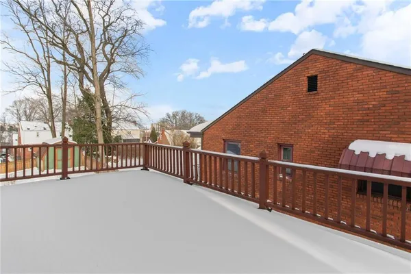 a view of a street from a balcony
