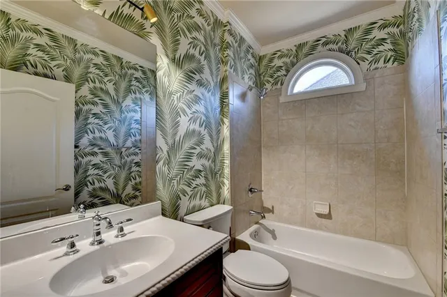 a large bathroom with a double vanity sink and a mirror