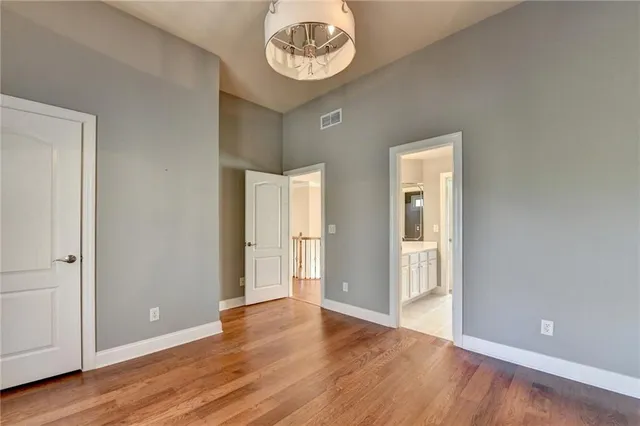 a view of backyard with deck and wooden floor