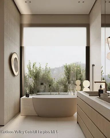 a bedroom with a large bed and a dresser