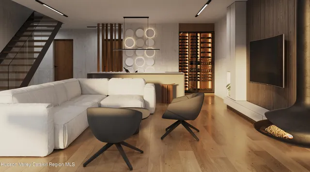 a view of living room with furniture and large window