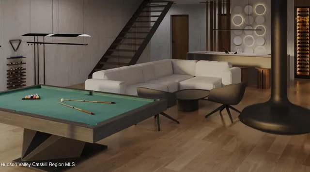 a living room with furniture fireplace and cabinets