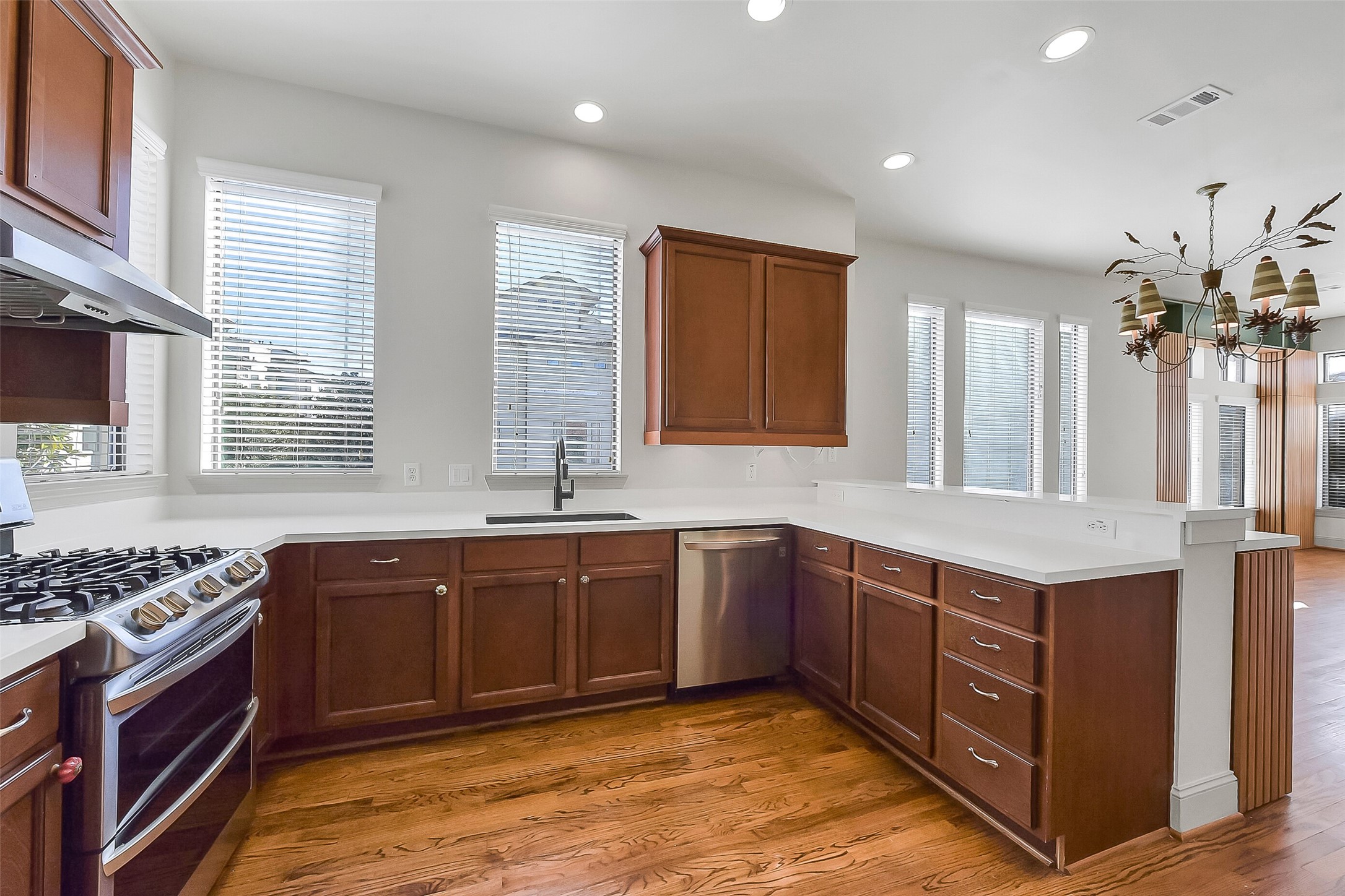 1929 Summer Street Houston, TX 77007 - Photo 13 of 27 One more view of this kitchen. Three windows offer pool views.