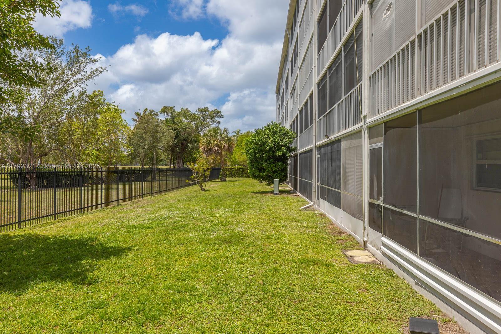 950 Hillcrest Drive, Unit 414 Hollywood, FL 33021 - Photo 43 of 51 a view of an outdoor space and yard