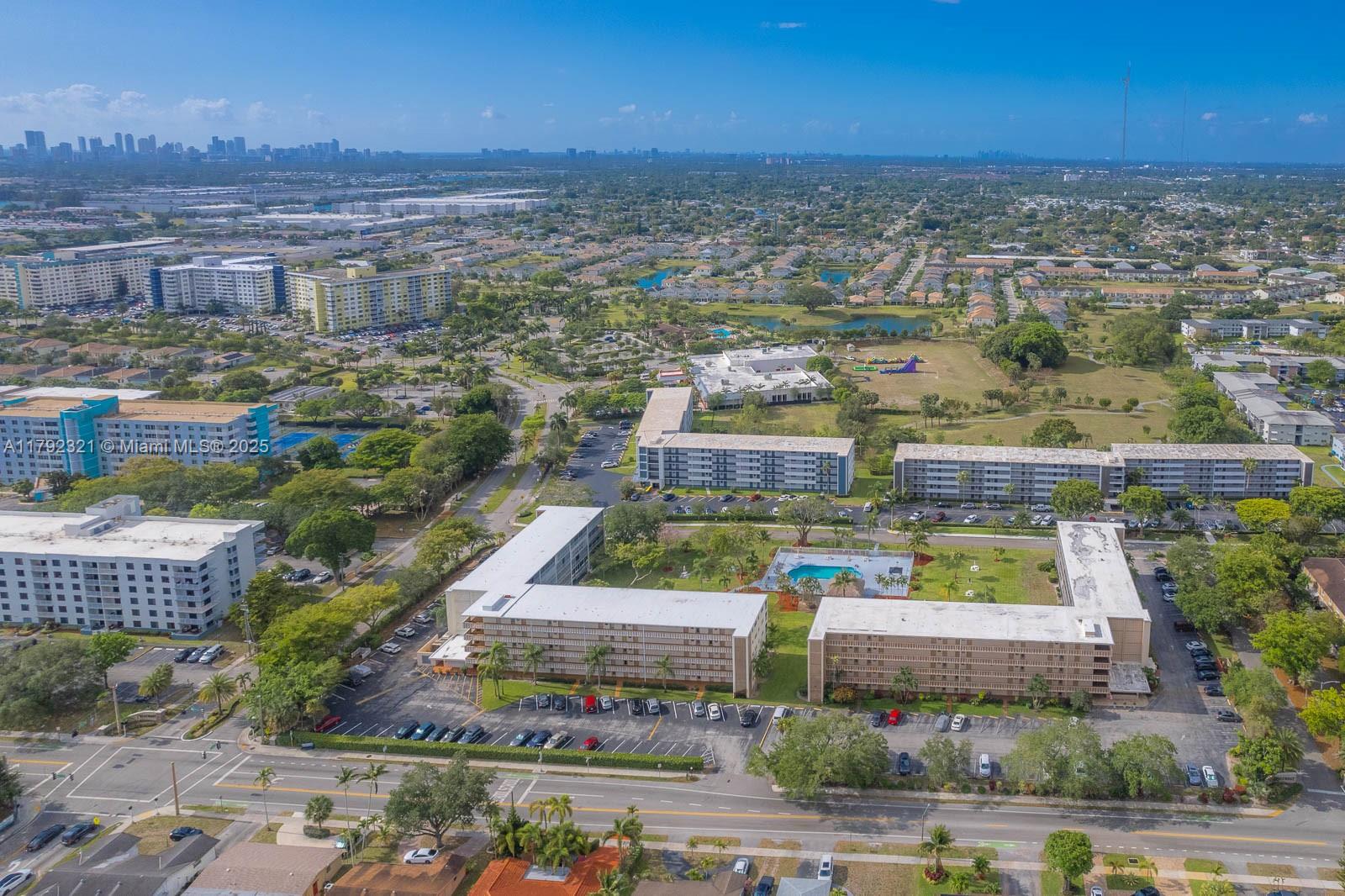 950 Hillcrest Drive, Unit 414 Hollywood, FL 33021 - Photo 51 of 51 an aerial view of residential houses with outdoor space and swimming pool