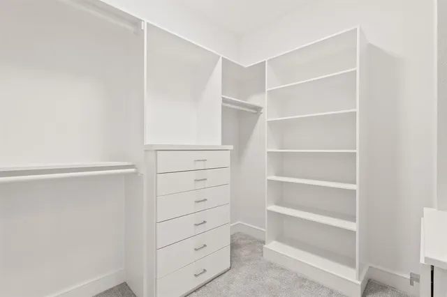 a view of an empty walk in closet