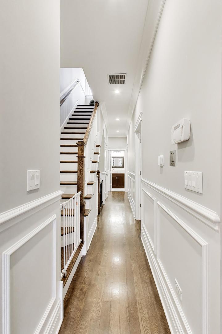 2680 North Orchard Street, Unit 3 Chicago, IL 60614 - Photo 14 of 26 a view of entryway and hall with wooden floor