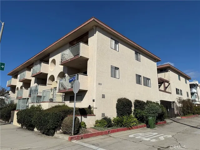 a front view of a house with garage
