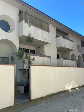 a living room with a couch and a table