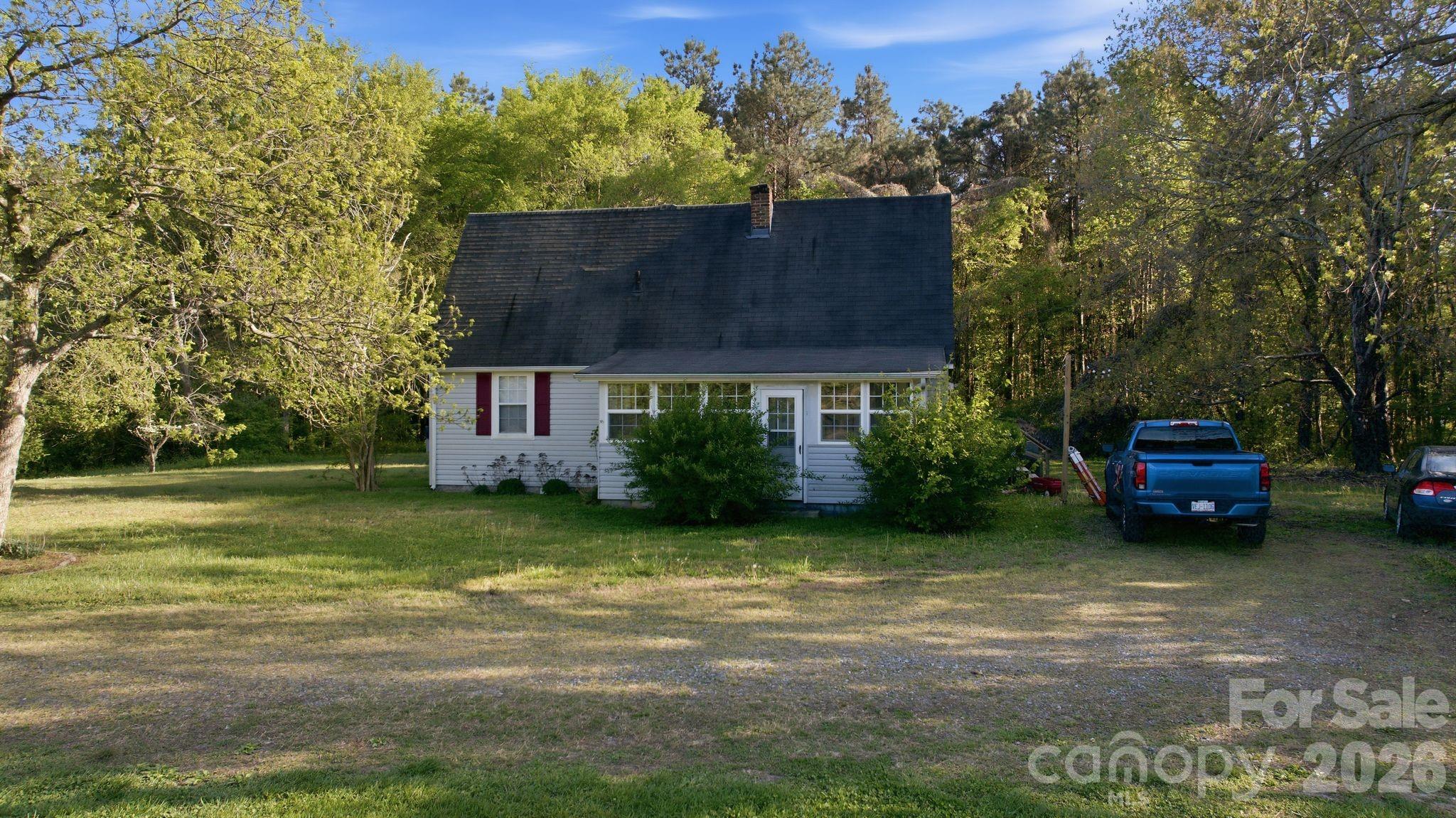 1862 Salem Church Road Lincolnton, NC 28092 - Photo 7 of 12 a view of a house with a yard