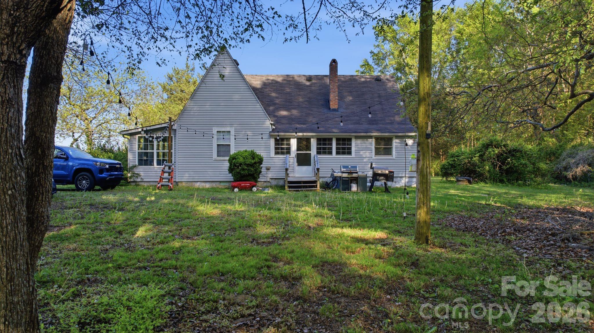 1862 Salem Church Road Lincolnton, NC 28092 - Photo 8 of 12 a view of a house with a garden