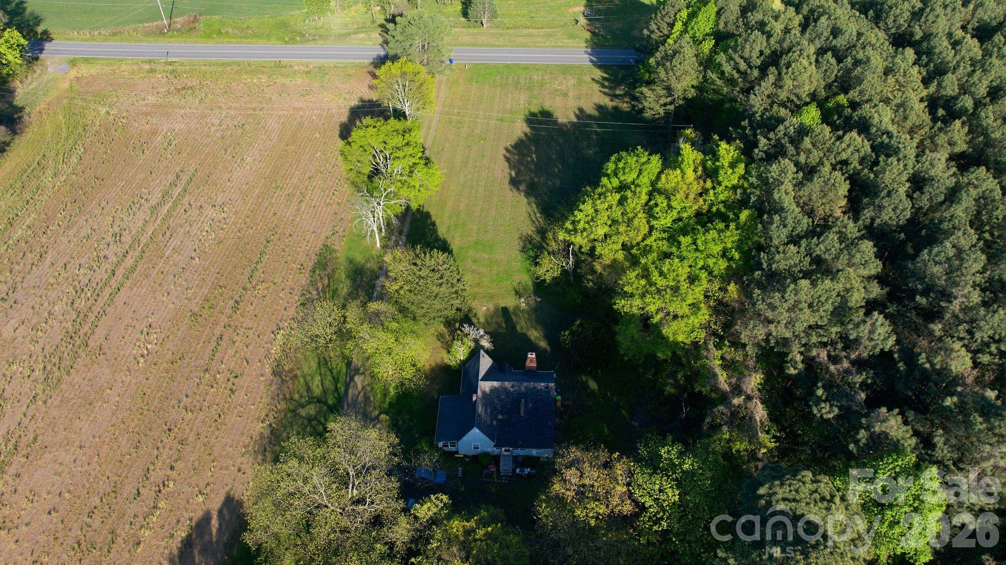 1862 Salem Church Road Lincolnton, NC 28092 - Photo 9 of 12 a view of a garden with a fountain