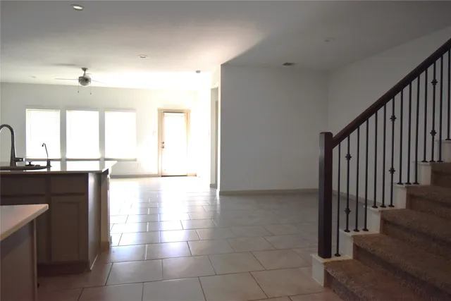 a view of a kitchen with a sink and dishwasher