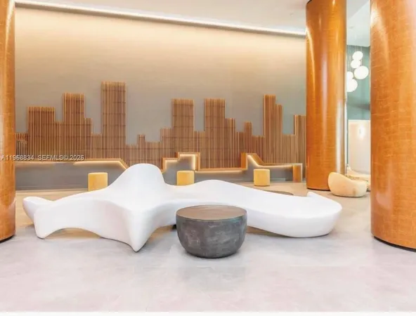 a view of a lobby with black carpet