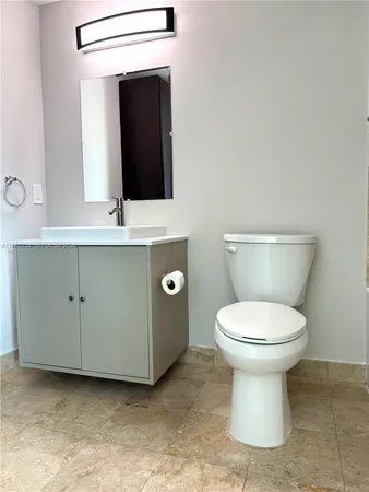 a bathroom with a shower and a bath tub
