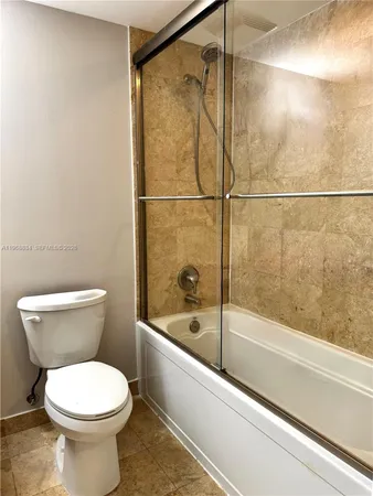 a room with closet and wooden floor