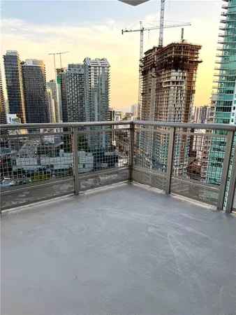 a view of a city with tall buildings