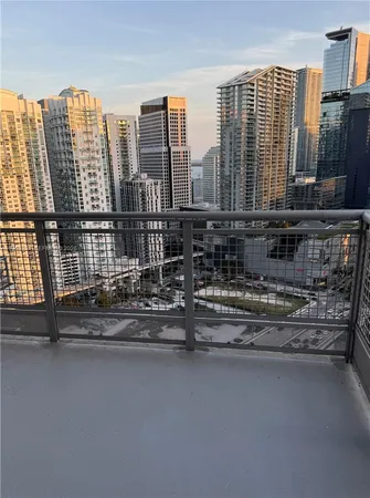 a view of a city with tall buildings