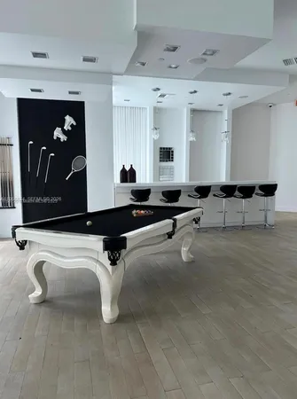 a living room with a rug