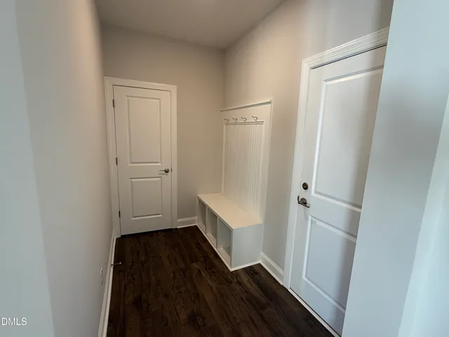 a view of bathroom with a tub and shower