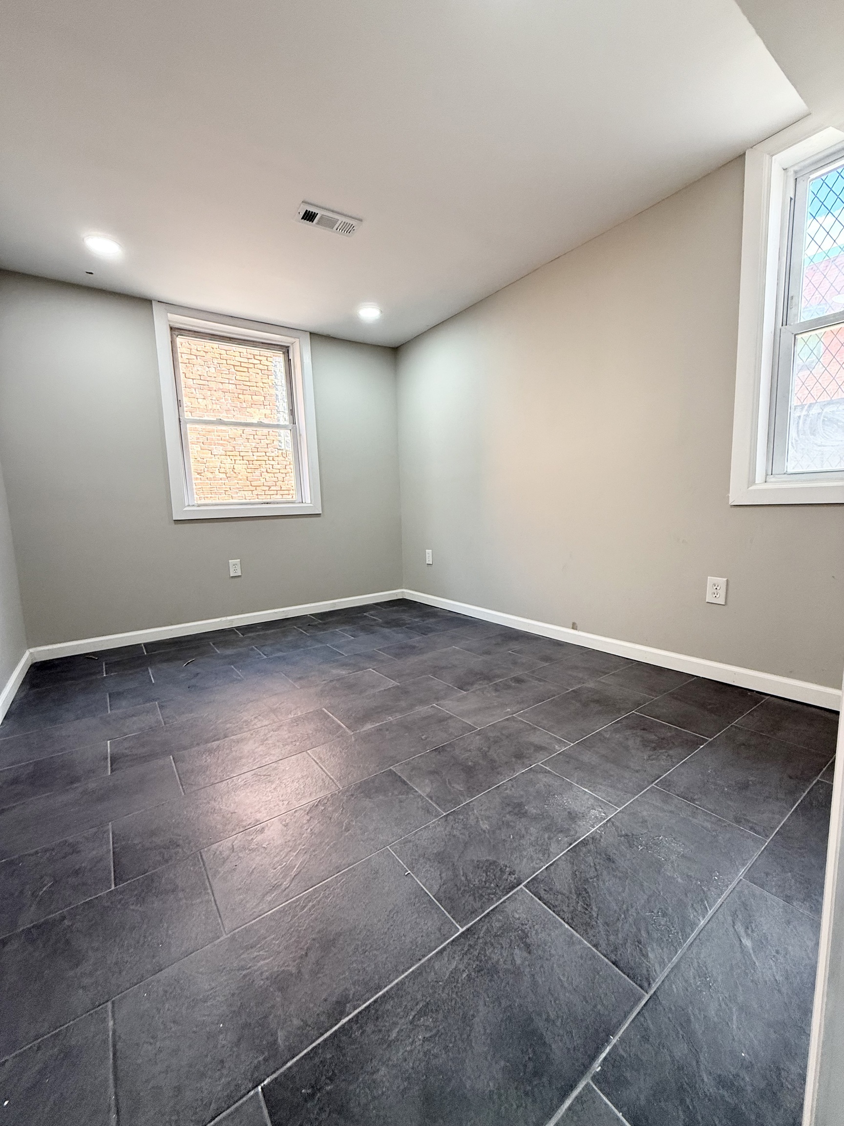41 Howe Street New Haven, CT 06511 - Photo 9 of 11 a view of an empty room with windows
