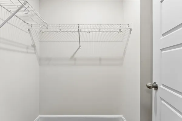 a view of a room with racks on the wall