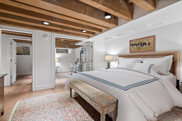 a bed room with a bed and a walk in closet