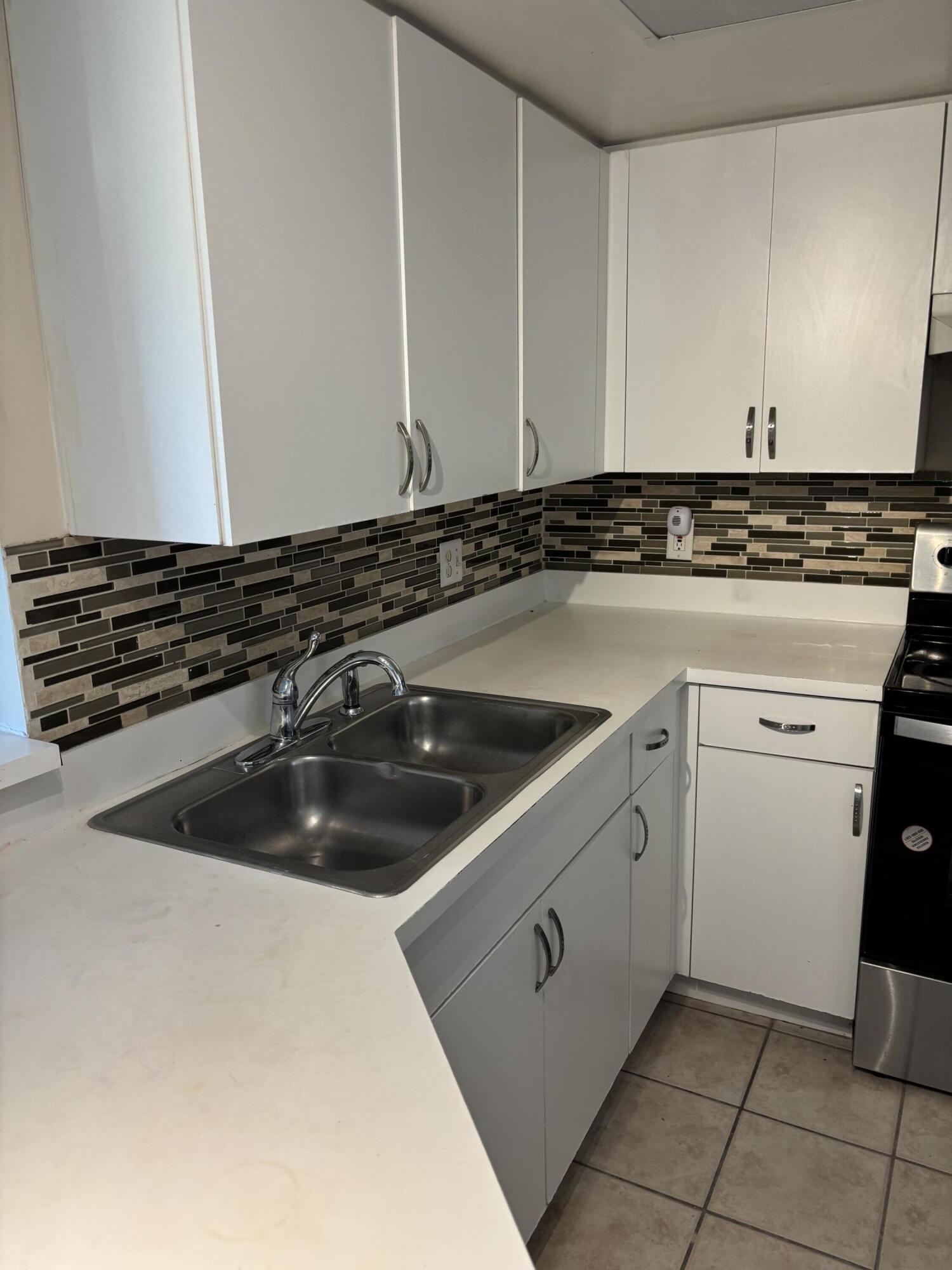 4155 Haverhill Road, Unit 1409 West Palm Beach, FL 33417 - Photo 4 of 16 IMG_2840