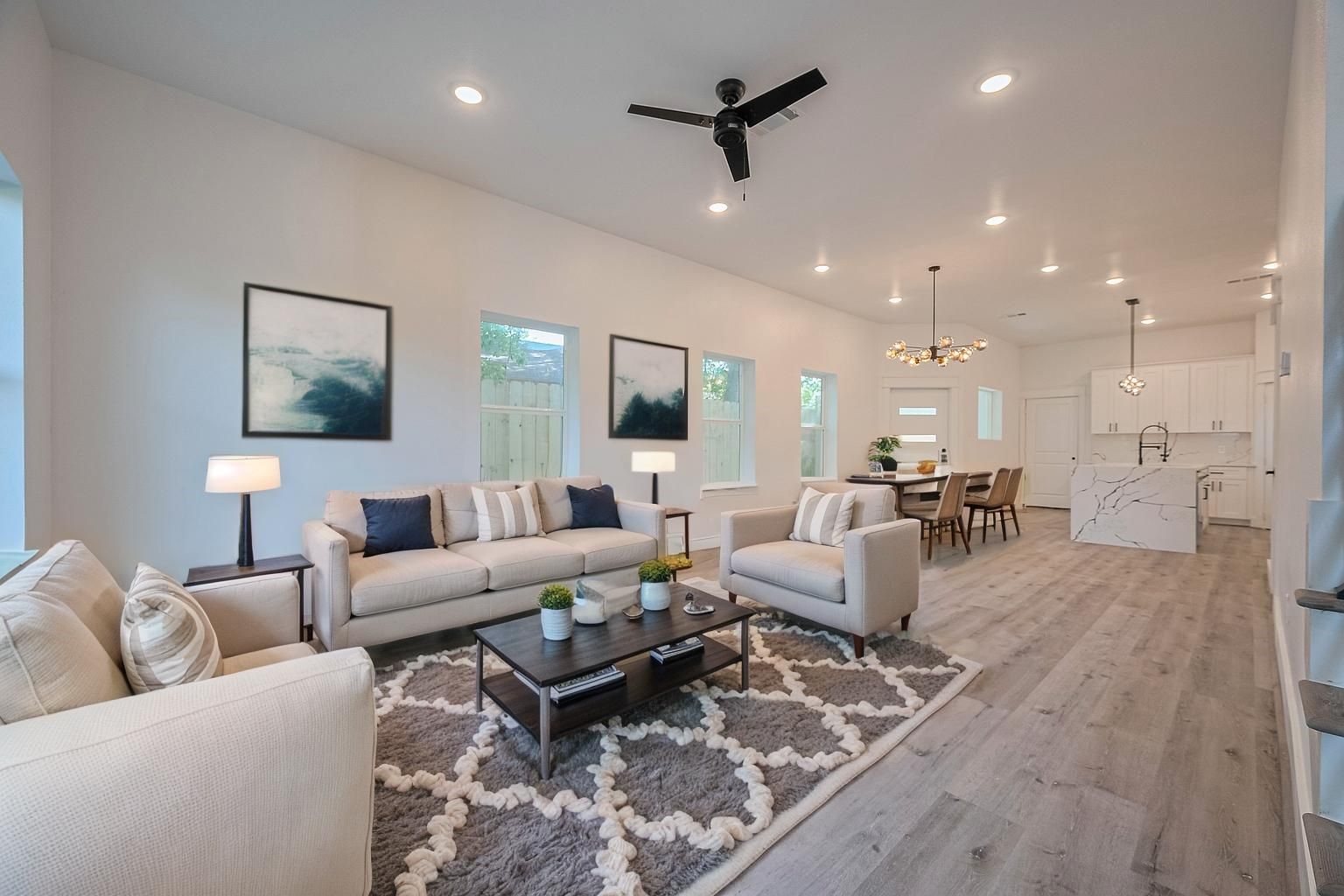 6747 Liverpool Street Houston, TX 77021 - Photo 14 of 18 The open-concept layout flows effortlessly from the living room into the kitchen and dining areas—perfect for gatherings.
**This room has been virtually staged.
