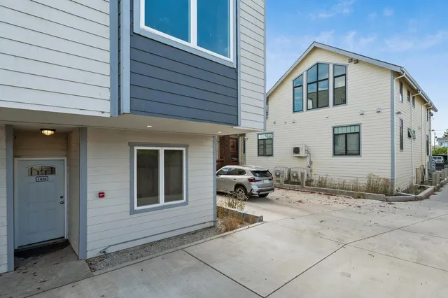 a backyard of a house with seating space