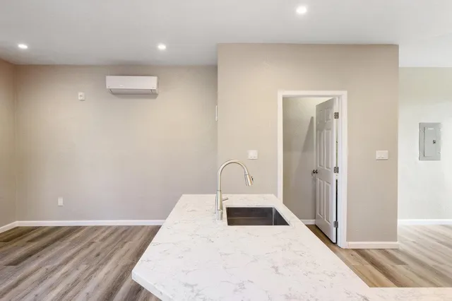 a kitchen with a wooden floor