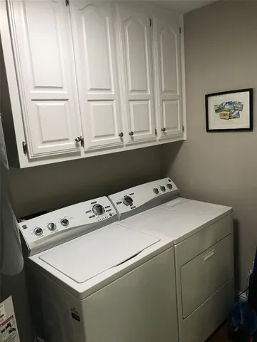 a bathroom with a shower toilet and sink