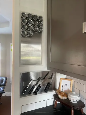 a bathroom with a sink and a cabinets