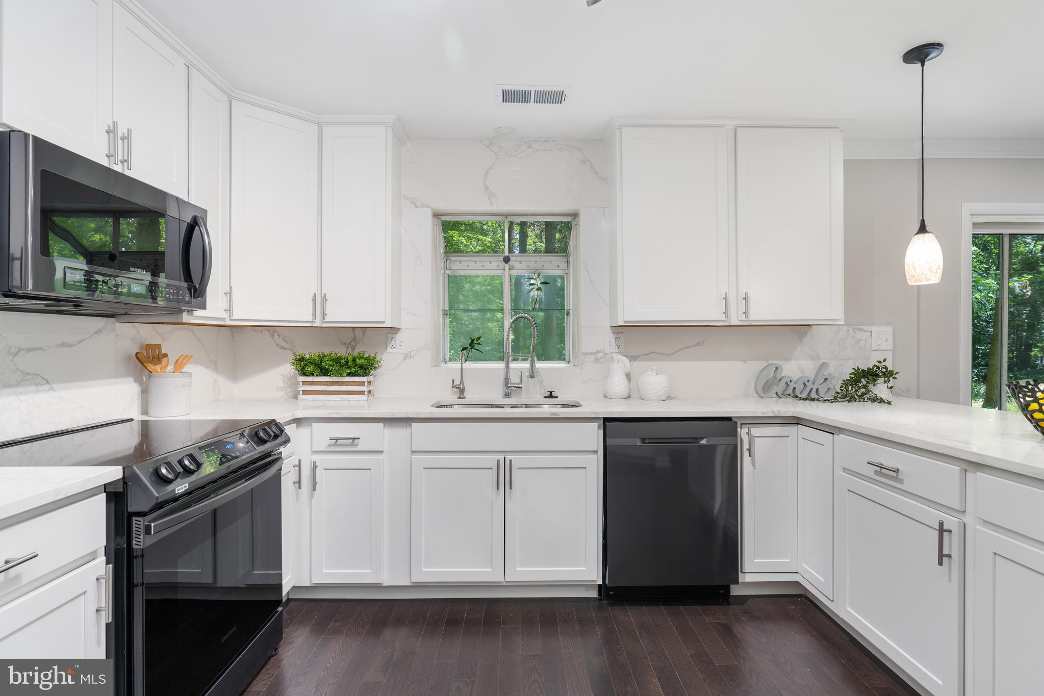 7725 Grasty Road Baltimore, MD 21208 - Photo 11 of 59 Stainless Steel Appliances and Quartz Countertops