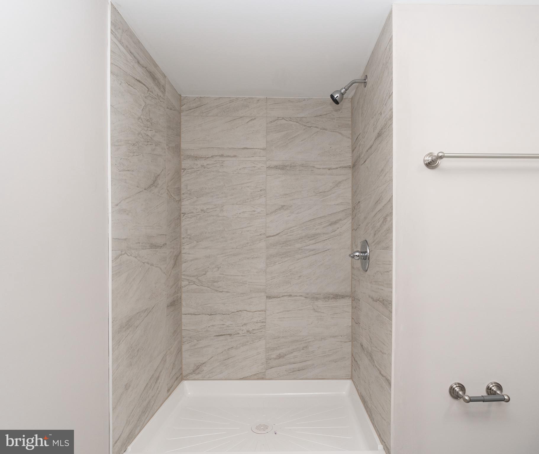 7725 Grasty Road Baltimore, MD 21208 - Photo 46 of 59 Custom Tile in the Full Bathroom
