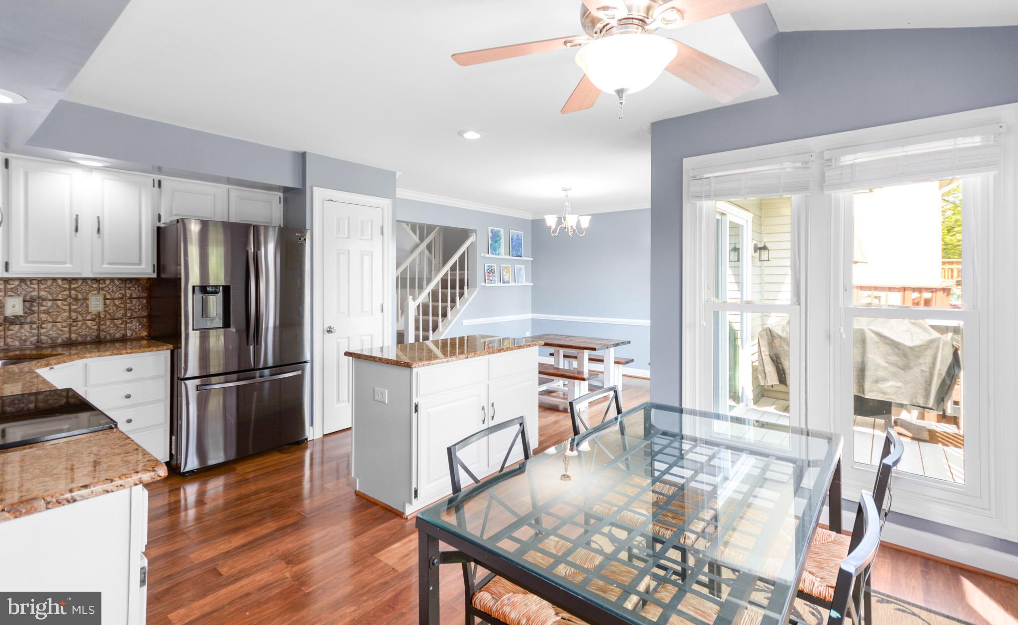 5560 Rivendell Place Frederick, MD 21703 - Photo 3 of 44 Kitchen features island and plenty of dining area