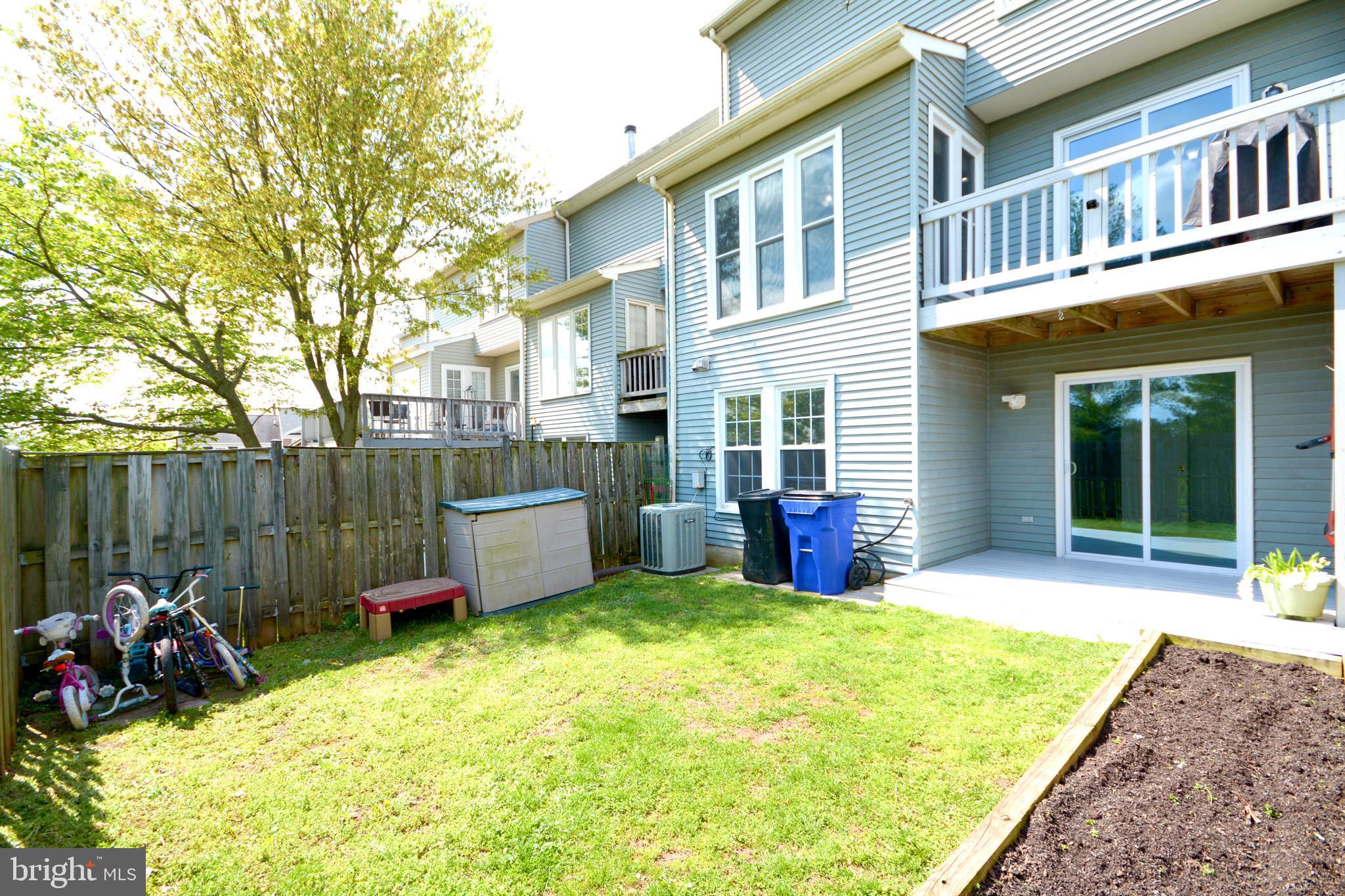 5560 Rivendell Place Frederick, MD 21703 - Photo 41 of 44 Garden area, patio AND a deck!