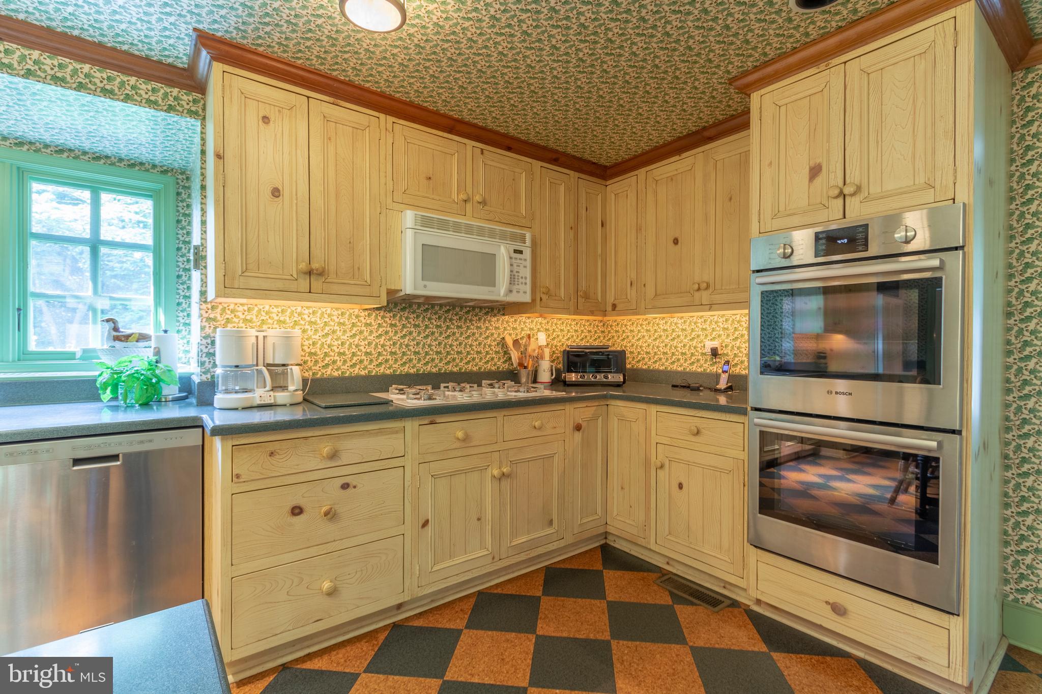 1496 Hampton Road Rydal, PA 19046 - Photo 22 of 51 Kitchen with entry to large Laundry Room