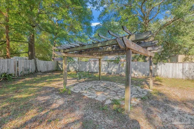 an aerial view of house with yard