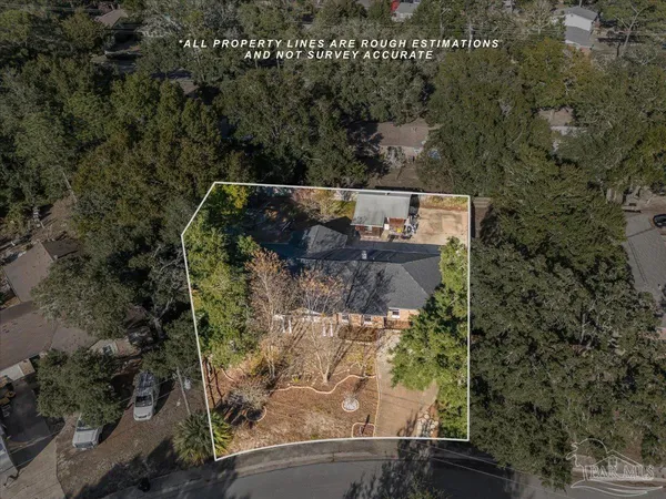an aerial view of houses with outdoor space