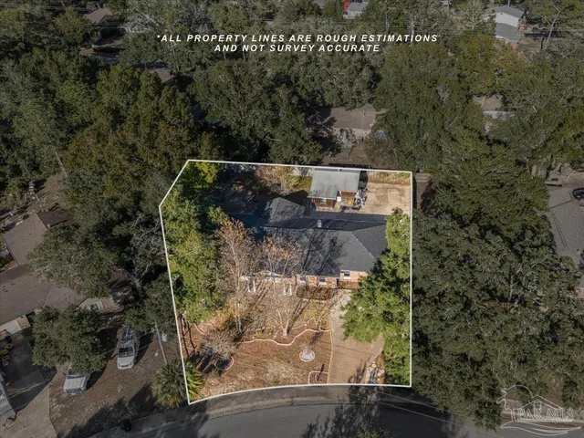 an aerial view of houses with outdoor space